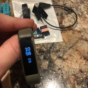 Fitbit Alta Watch with 26 bands and charger